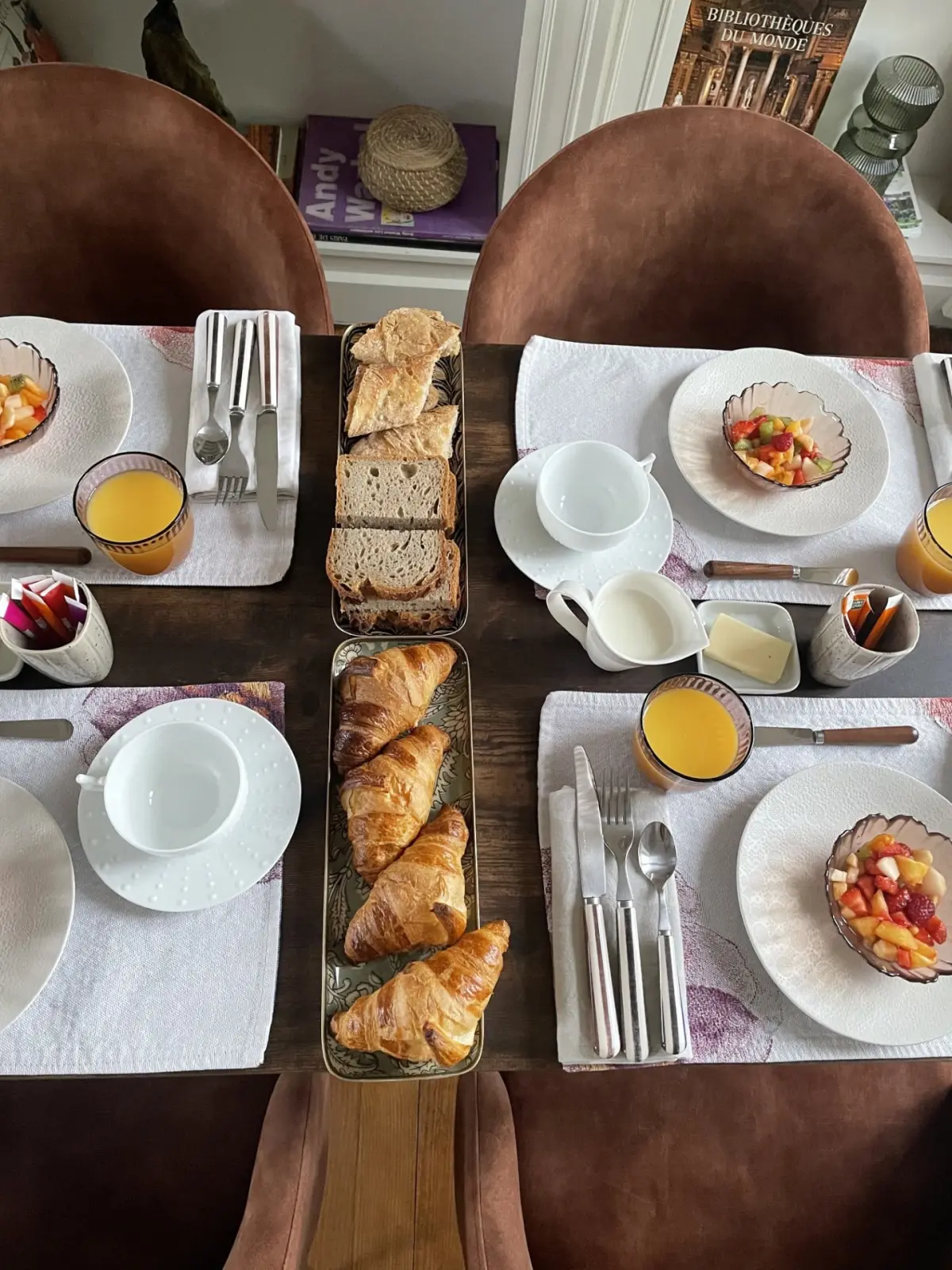 Breakfast at Domaine de Marculfo from above: croissants, bread, fruit salads and orange juice